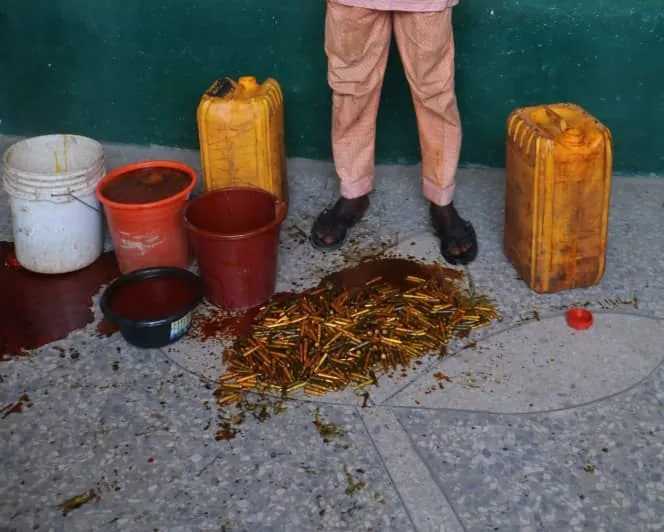 FCT Police Seize 488 AK-47 Rounds Hidden in Palm Oil Cans!