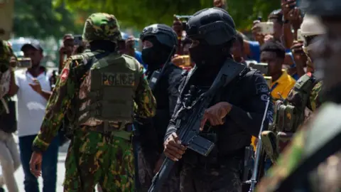 Haiti's Turmoil: Missing Kenyan Officer Found Dead - What Now?
