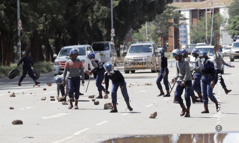 Harare Unrest: Police Clash with Protesters Over Barricades!