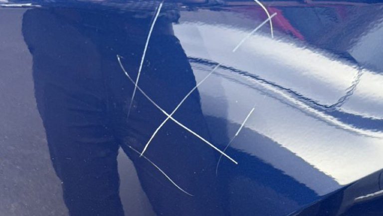 Man Caught Vandalizing Tesla with Swastika in Colorado Gym Bust