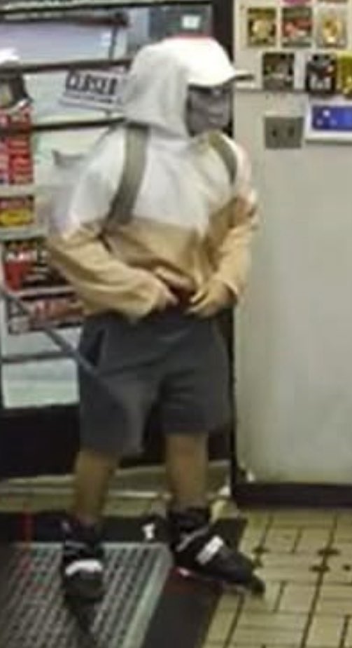 Armed Robber on Rollerblades: Gun-Wielding Thief Skates Away!