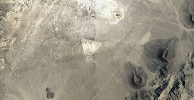 SHOCKING DISCOVERY: Is the Nevada Desert Hiding Alien Secrets?  
A Triangle Found in the Desert Raises Questions of Cover-Ups!