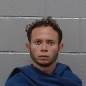 🚨 Shocking Arrest: Man Accused of Kidnapping Teen in Stolen Car!