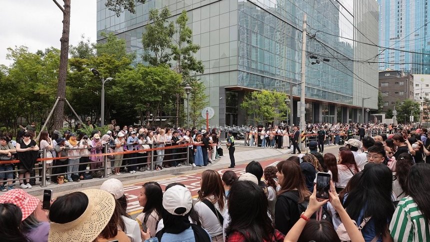 1,500 ARMYs Gathered at HYBE: Celebration or Dangerous Gathering?
