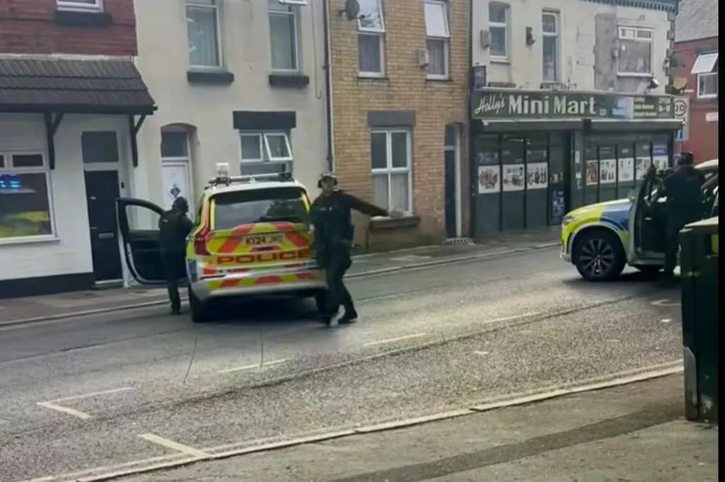 Armed Police Confront Machete-Wielding Man, School Locked Down!