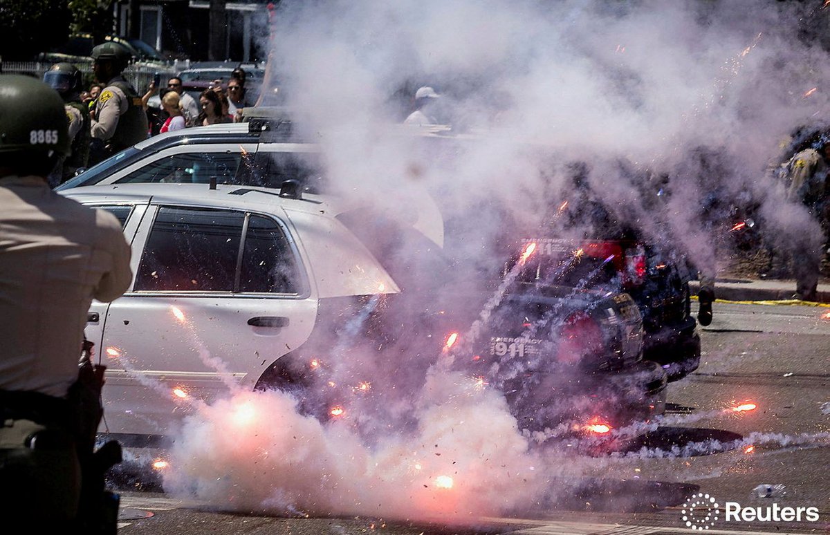 Protesters Clash with Police as Firework Erupts in Standoff!