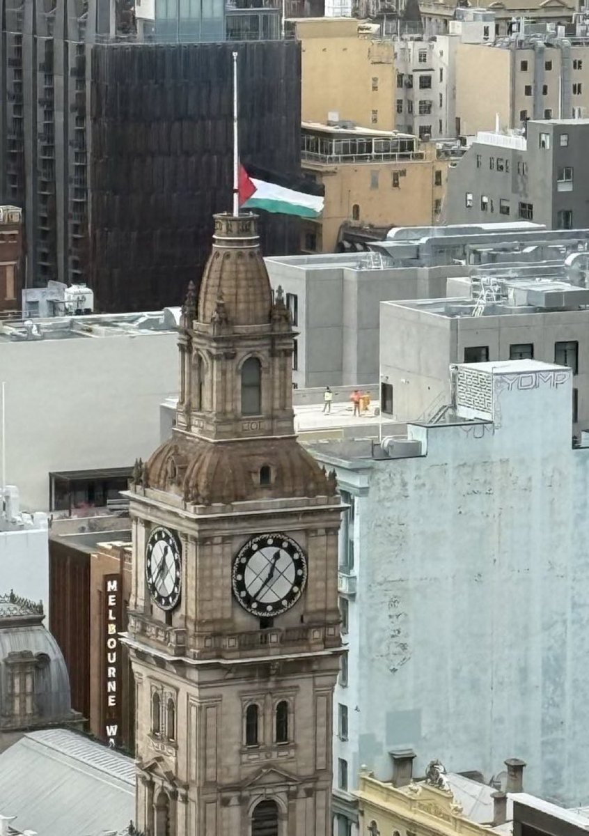"Outrage as Melbourne City flies massive Palestinian flag on historic building - Islamist colonization exposed!" —  Melbourne City controversy, Palestinian flag display, Historic building incident