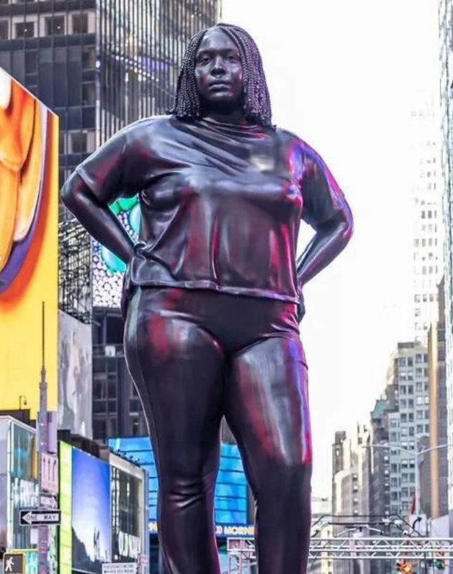 BREAKING: 12-Foot Plus-Size Statue Sparks Outrage in Times Square!
