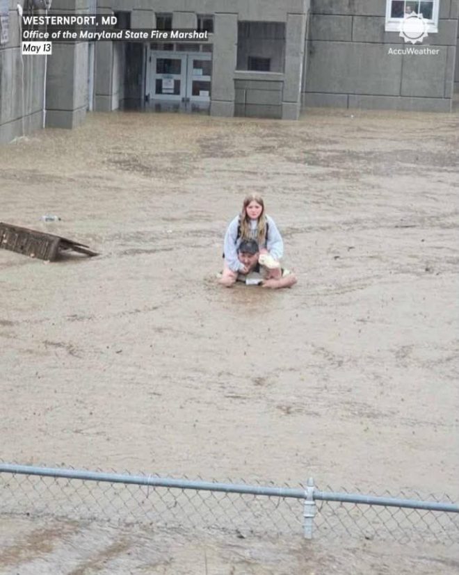Father Faces Backlash for Daring School Rescue Amid Flood Chaos — flooded school rescue, father saves daughter, Maryland flood response
