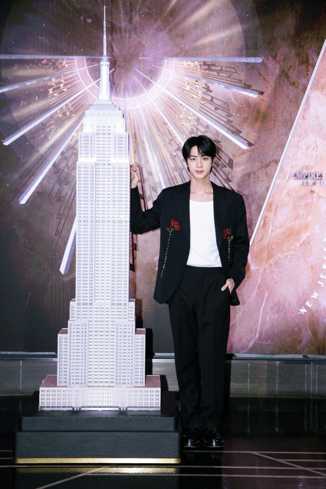 Jin's Empire State Building Takeover: Colors of Controversy! — Jin Empire State Building lighting, 2025 BTS album release, New York City iconic landmarks