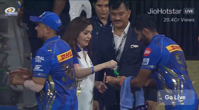 Nita Ambani's Sanitizer Surprise: Bumrah's COVID Connection? 🤔 — Nita Ambani COVID safety measures, Bumrah Dettol sanitizer gesture, MI trophy history 2025