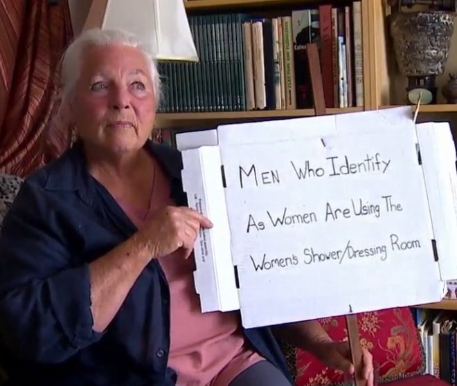 "80-Year-Old Woman Banned for Removing Man from Women's Changing Room with Minors - Holds Controversial Sign for 2 Days!" —  Elderly woman banned from pool, Changing room incident, Warning sign protest