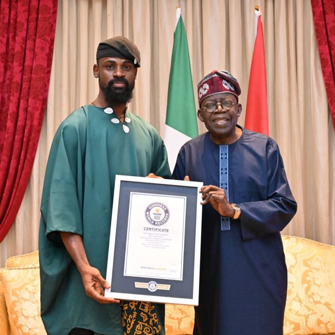 Exclusive: Nigeria's President Receives Controversial Chess Gift! — Nigerian President visit, Adire Chess board presentation, world record certificate Nigeria