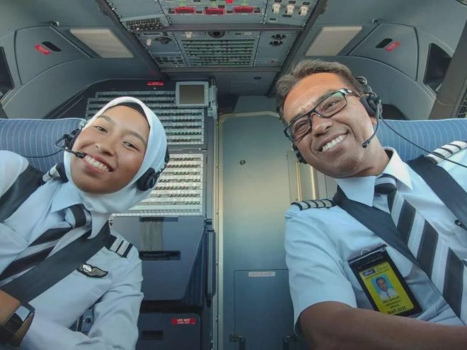 "Father sacrifices 40-year career to fly with pilot daughters at AirAsia - Is family loyalty worth risking it all?" — airline career change, father daughter pilot team, family aviation dream