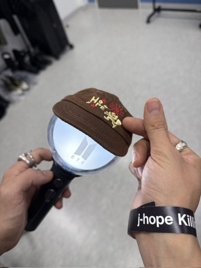 J-Hope Teases Fan Chant: Outfit Secrets Remain! 🤫🎤 — fan engagement platform, K-pop community app, BTS fan interaction