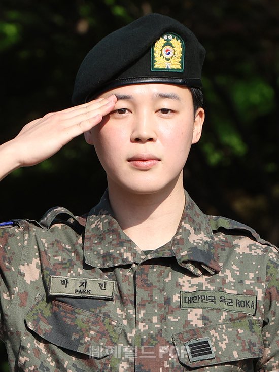 "Jimin's Military Discharge: Radiant as a Ray of Sunshine or Overhyped Hype?" — K-pop idol, military discharge, shining star, celebrity comeback