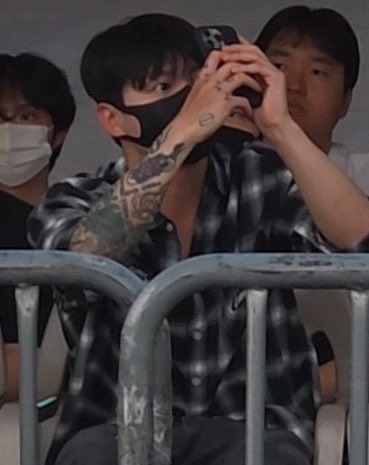 Jungkook's Jacket Removal Sparks Scorching Weather Surge! — celebrity concert weather impact, K-pop fashion trends, Jeon Jungkook jacket removal effects