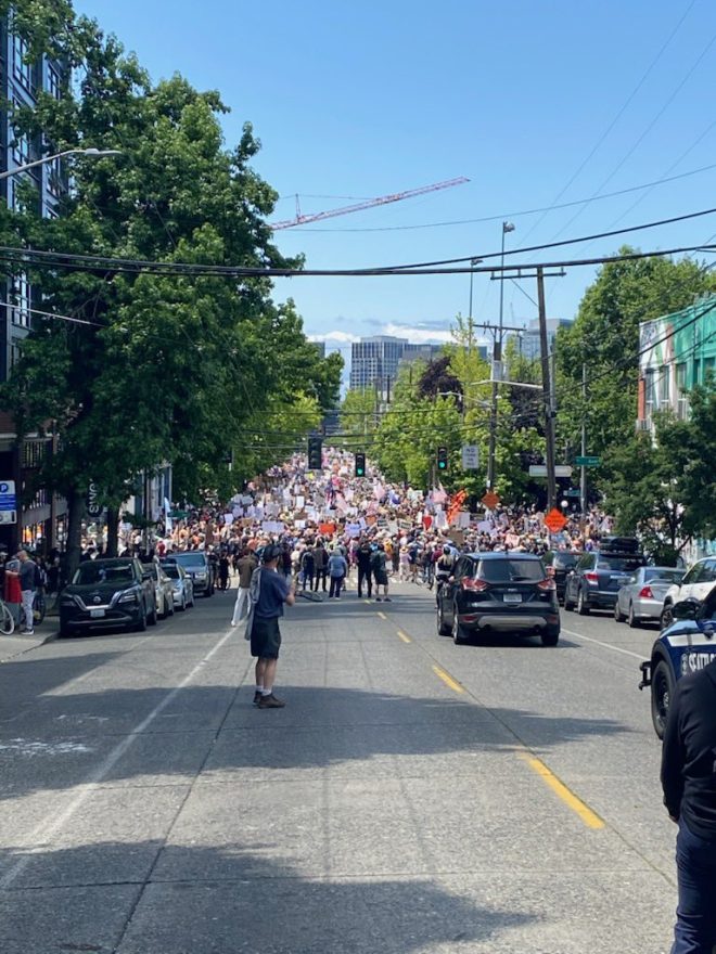 "Massive #NoKingsProtest Marches 1.5 Miles Without Any Property Damage - What's Their Secret?" —  Seattle protest, peaceful demonstration, community solidarity