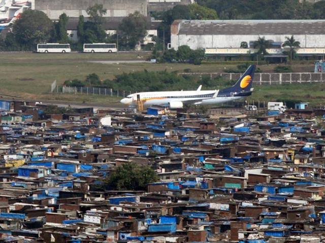 Shocking Slums Next to India's Busiest Airport: A Security Nightmare! — airport security risks, slum clearance in India, urban sanitation initiatives 2025