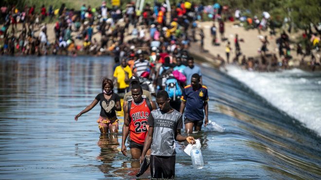 Trump's Shocking Move: 500K Haitians Must Leave Now! — Haitian migrant deportation, temporary protected status news, Trump administration immigration policy