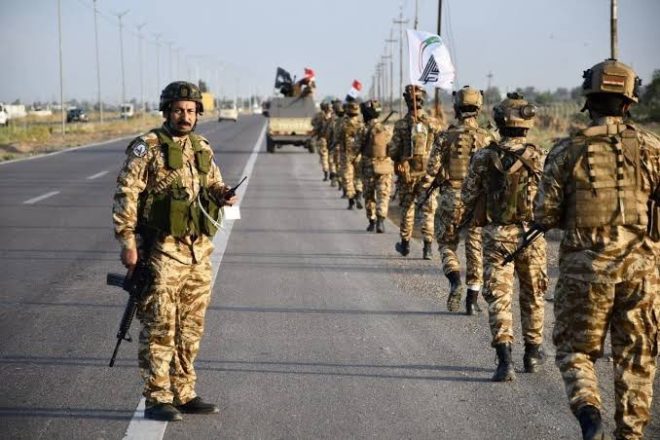 US Bases in Danger: Iraqi Militias Armed by Iran! — Middle East conflict alerts, Iraq armed groups threats, Iran missile support 2025
