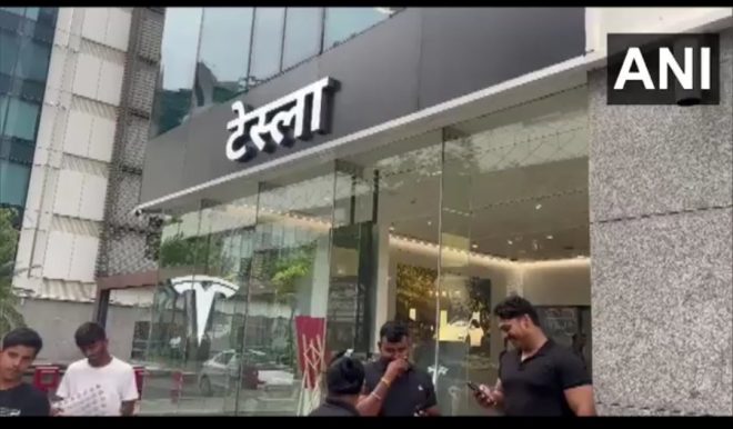 "Tesla Showroom in Mumbai under Threat of Demolition for Using Hindi Script - MNS Workers Outraged! π¨" β Tesla showroom controversy, Maharashtra protests, Hindi signage backlash
