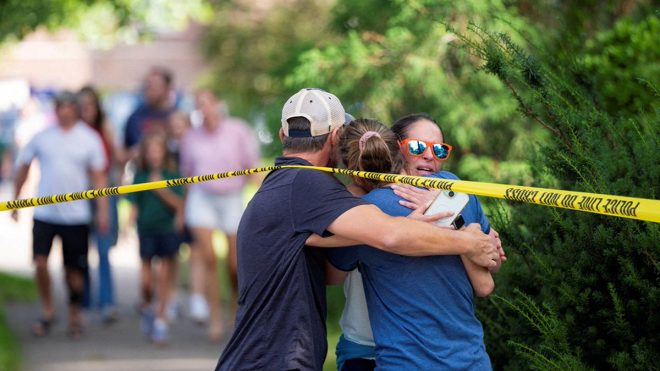 Church Shooting Shocks Community: Children Among Victims —  Minneapolis church shooting aftermath, Annunciation Church tragedy images, gun violence impact on community