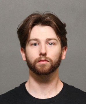 Firebombing Tesla Showroom: Terrorism or Free Speech? — Terrorism charges in Colorado, Tesla showroom firebombing case, Cooper Frederick legal consequences
