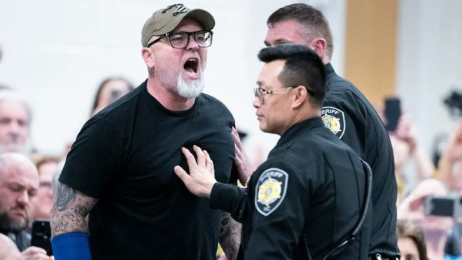 Flag Arsonist: Town Hall Outburst Unveils Shocking Motive! — American Flag protest news, North Carolina town hall controversy, political performance art 2025