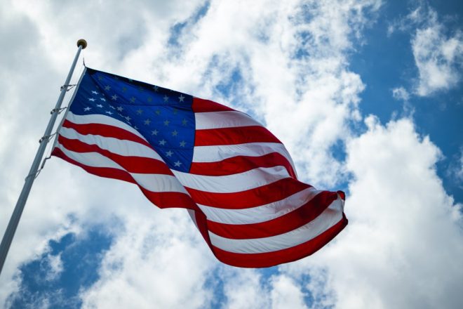 "Outrage erupts as American flag desecrated in shocking display of disrespect towards our nation's freedom and unity" —  American patriotism, National emblem, Liberty symbol