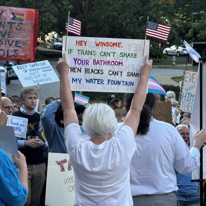 Shock as Elderly Liberal’s Racist Sign Sparks Outrage! —  Elderly protest signs, Virginia governor race 2025, racial equality and bathroom access