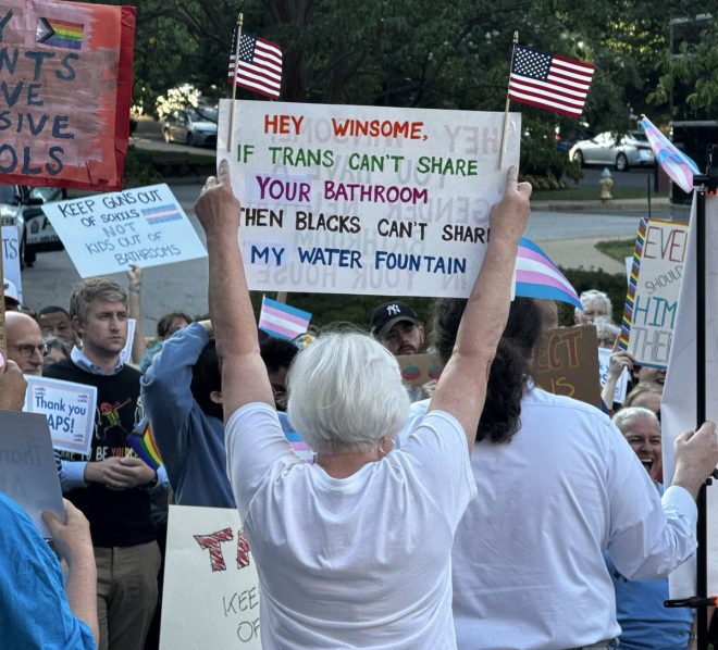 Shocking Twist: Democrat Volunteer Behind Racist Protest! — Racist protest sign controversy, Abigail Spanberger campaign scandal, Winsome Sears protest incident