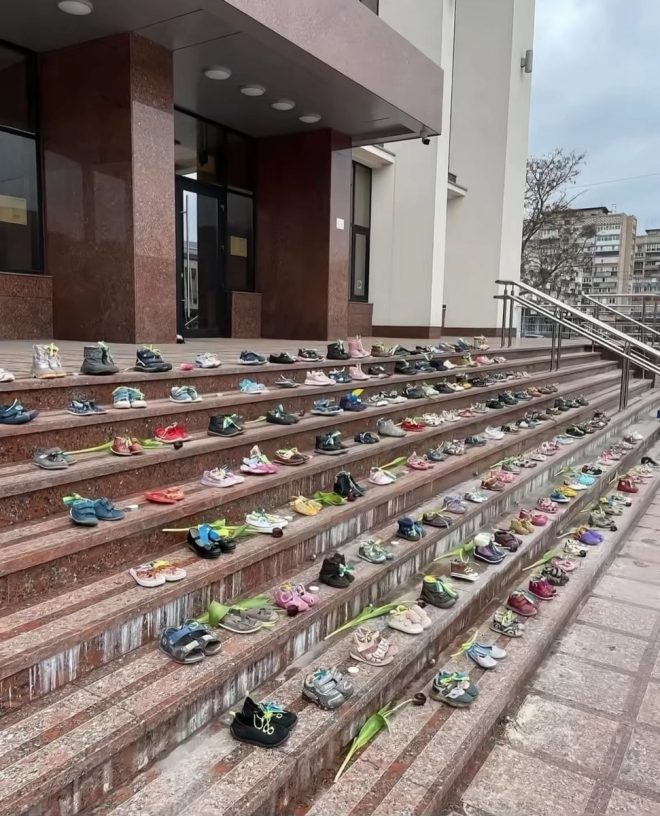 Children’s Shoes at School: A Heartbreaking Reminder — memorial shoes for children, school entrance tribute, remembrance of lost youth 2025