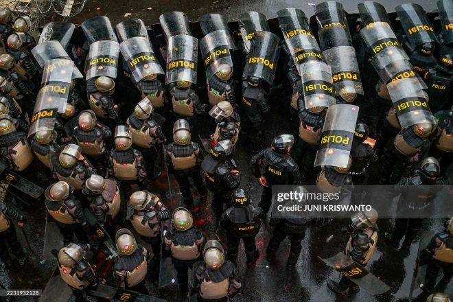 "Police Crackdowns Lead to Chaos: 3,337 Arrests, 1,042 Injuries, and 10 Deaths - What Really Happened?" — Indonesian human rights organization, police brutality, government crackdowns
