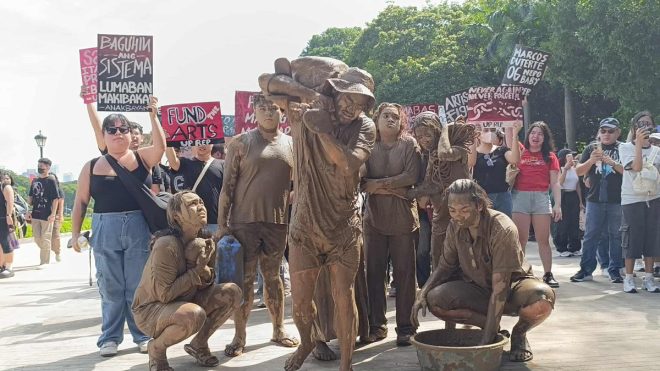 "Revolution in the Mud: Protesters Declare Country in Crisis" — Protesters covered in mud, Political unrest demonstration, Activists in muddy protest