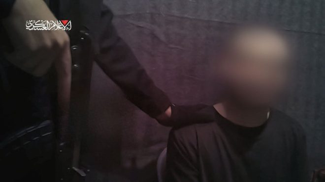 The Shocking Truth: Hamas Releases Hostage Image with Cryptic Message "Soon..." — Hamas hostage video, Palestinian state threat, Gunpoint hostage image