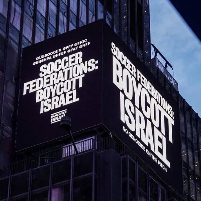 Times Square Billboards Urge Soccer Leagues to Boycott Israel! —  soccer league protests, Times Square activism, Israel boycott campaign